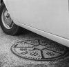 Car over manhole