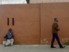 Men and wall - Johannesburg, 2006